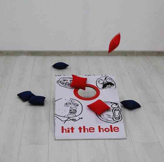 Аттракцион, Игра Hit the Hole (Попади в лунку) 
