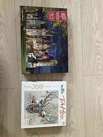 Две коробки пазлов 