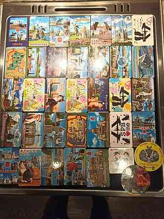 Отдам 33 магнита 